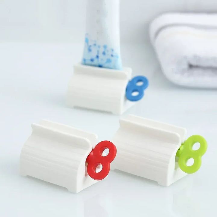 Toothpaste Squeezer Tooth Paste Holder Oral Care Bathroom Tools Tube Cosmetics Press Facial Cleanser Rolling Squeezing Dispenser